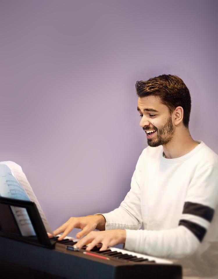 Henry Brennan as Musical Director in rehearsals.