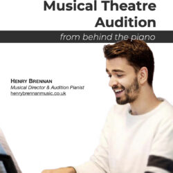 The cover page of the Preparing Musical Theatre Audition guide. The title is in a bold, grey font. Underneath in a thinner italic, it reads 'from behind the piano'. The bottom two thirds of the page are occupied by an image of Henry smiling whilst playing a piano.